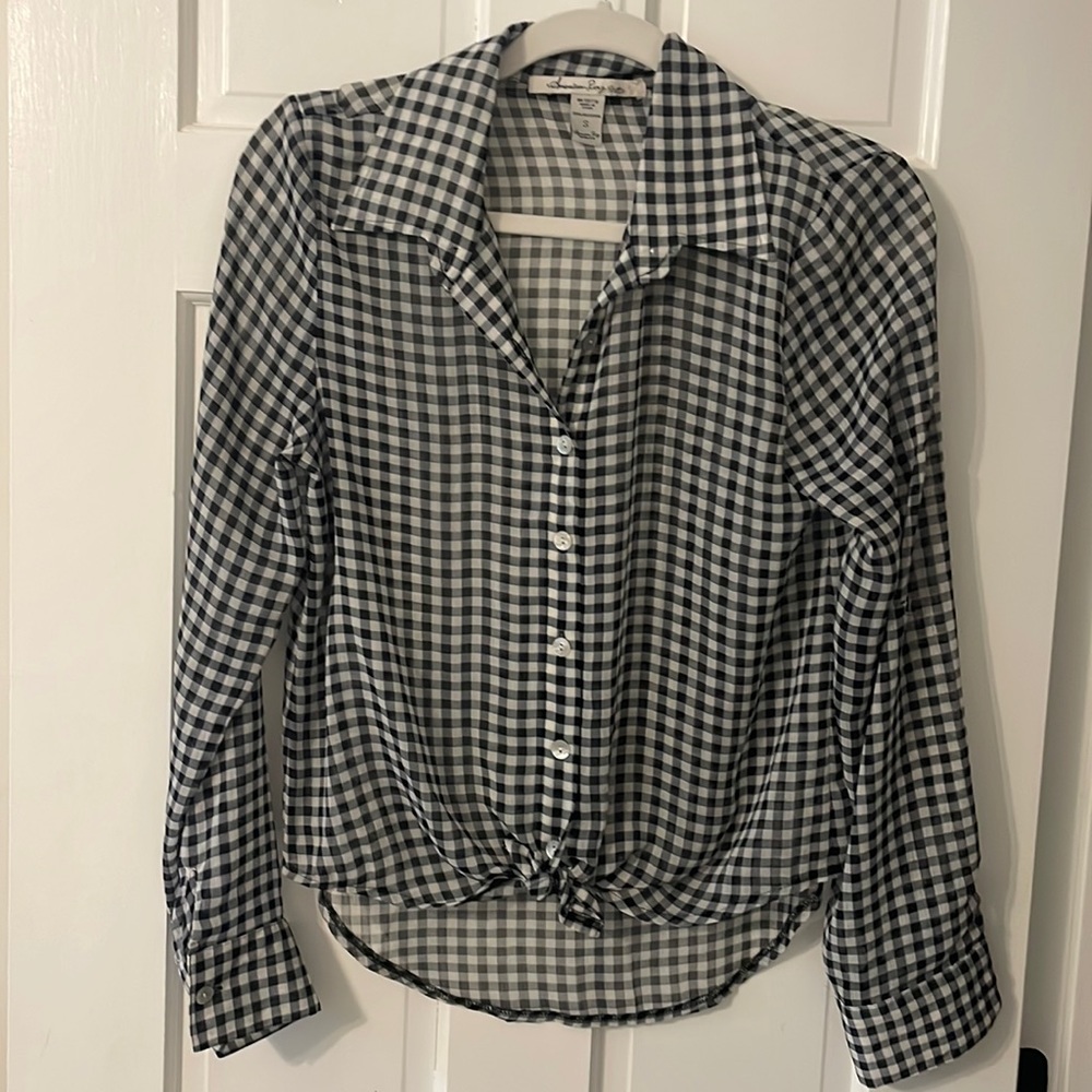 Black and white checkered blouse
